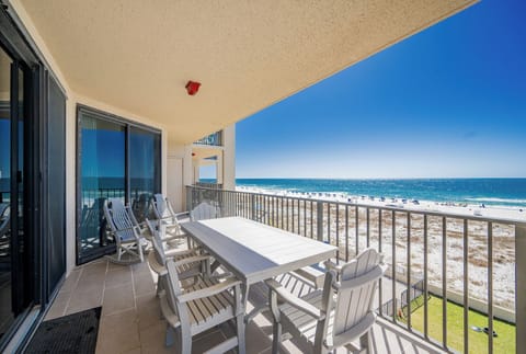 Enjoy meals or drinks at the spacious table while soaking in the beautiful beach views from your balcony
