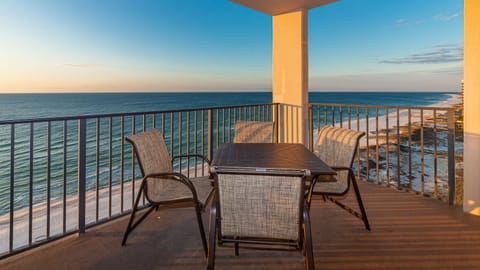 Savor your morning coffee at the outdoor table while enjoying expansive views of the tranquil waters and shoreline