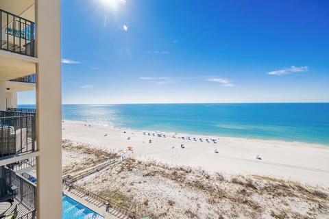 Inviting shoreline and sparkling waters from your balcony, perfect for relaxation and enjoyment