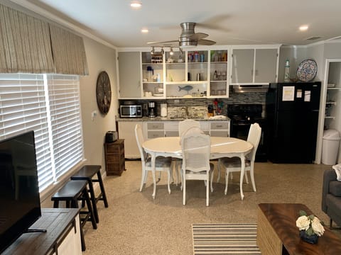 open view to living dining and kitchen area.