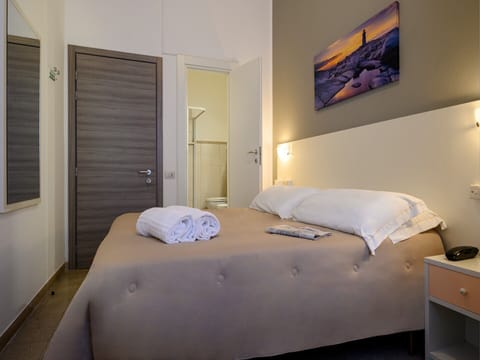 Economy Double or Twin Room | In-room safe, desk, cribs/infant beds, free WiFi