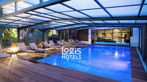 Indoor pool, outdoor pool, open 9:00 AM to 9:00 PM, pool umbrellas