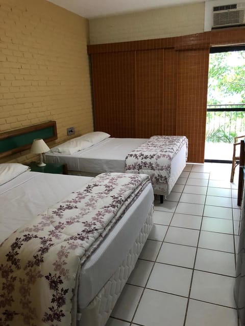 Deluxe Apartment, 2 Bedrooms, Kitchen, Beach View | 1 bedroom, premium bedding, minibar, in-room safe