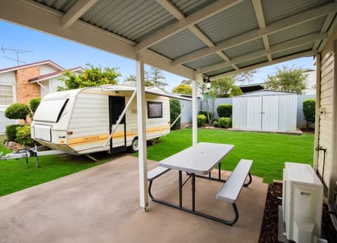 Back Patio, BBQ, Outdoor Setting and Caravan (acts as 3rd bedroom)