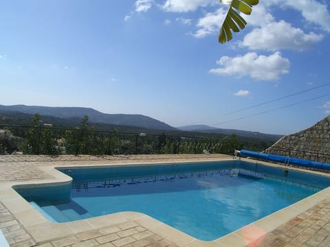 Lower terrace with a large 12m x 5m pool.with stunning views over the valley .