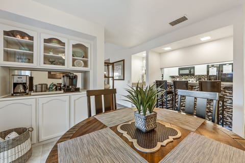 Dining room with table that seats up to 6 and Coffee Bar.