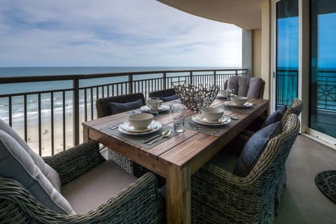 Dine oceanfront on your private balcony, with sweeping Atlantic views j