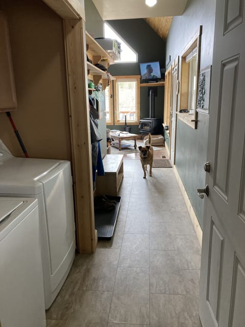 Entry to the house from the garage through the laundry and into the mudroom