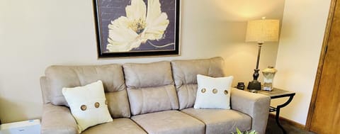 Cozy living room with plush seating and warm lighting