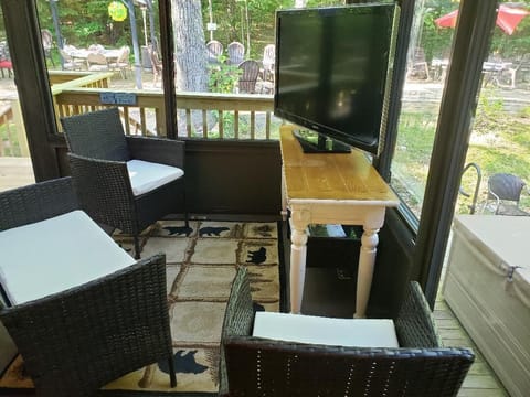 On a rainy day - Sun Room TV is #6 
One TV for each guest !