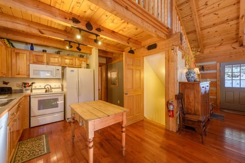 Martin's Nest Kitchen with Hallway to Main Level Bedroom, Stairs Accessing Lower Level