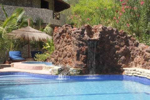 Outdoor pool, open 7 AM to 8 PM, pool umbrellas, sun loungers