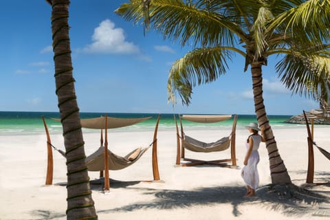Private beach, white sand, sun loungers, beach umbrellas