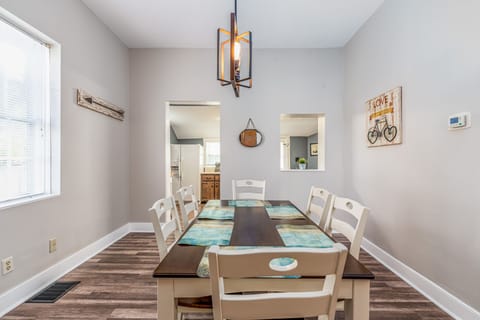 Updated, comfortable and roomy dining area to gather in.