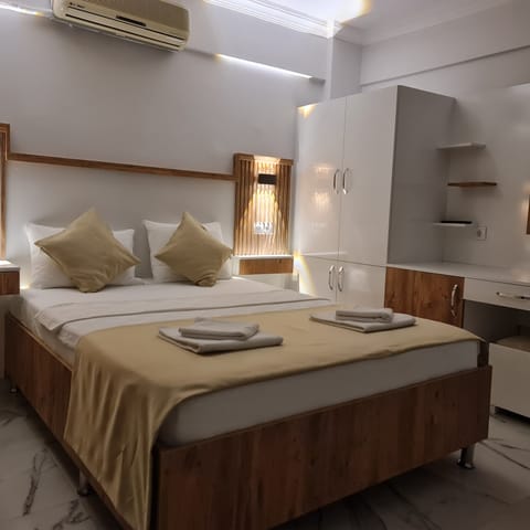 Standard Double Room, City View | Iron/ironing board, free WiFi, bed sheets