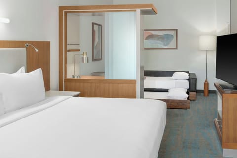 Desk, blackout drapes, iron/ironing board, free cribs/infant beds