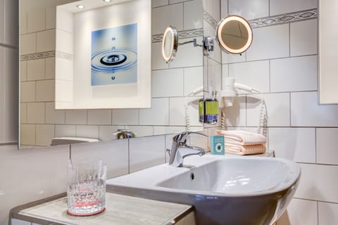 Hair dryer, towels, soap, shampoo