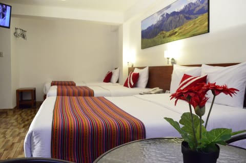 Family Room | Premium bedding, down comforters, in-room safe, WiFi (free)