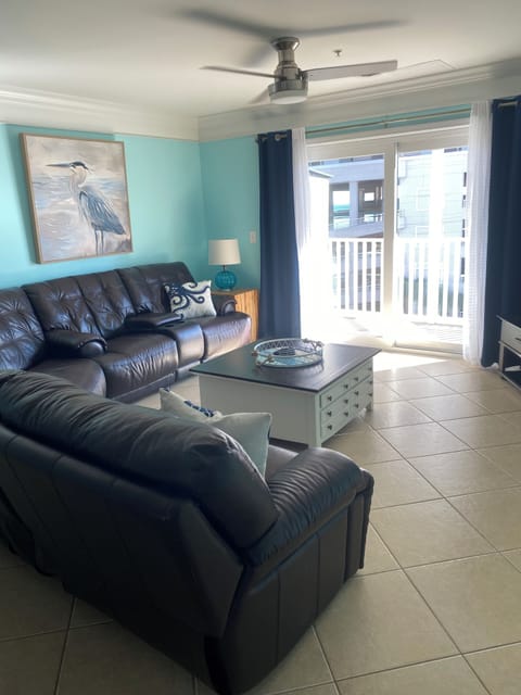 Main den with a slider to the balcony and that beautiful ocean view.