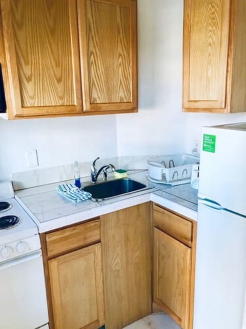 Standard Room, 2 Double Beds, Non Smoking | Private kitchen | Fridge, microwave, coffee/tea maker, electric kettle