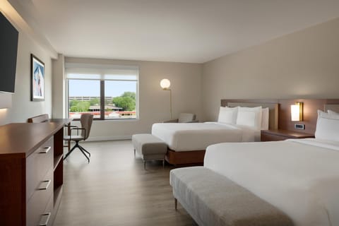 Premium bedding, desk, laptop workspace, iron/ironing board