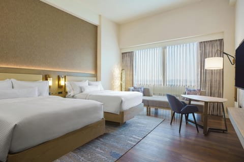 Premium bedding, down comforters, pillowtop beds, in-room safe