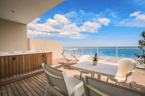 Junior Suite, Terrace, Sea View | Premium bedding, minibar, in-room safe, desk