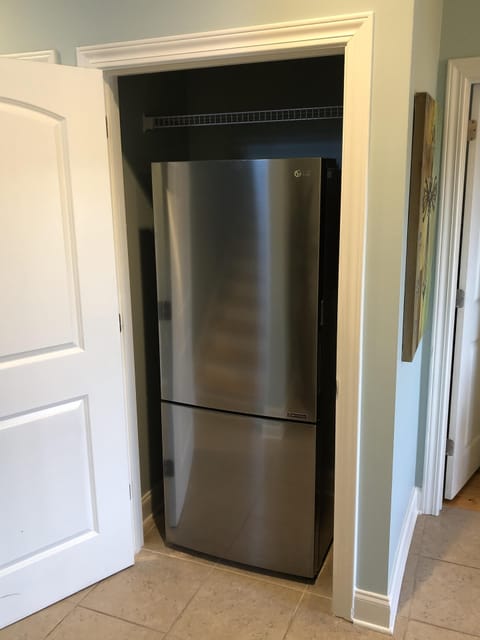 Second refrigerator in hall closet.