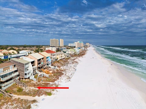 Direct beach access to the emerald waters of the Gulf of Mexico