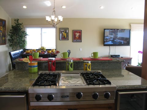 Viking cooktop, Counter Seating, Dining Room, and Living Room open floor plan