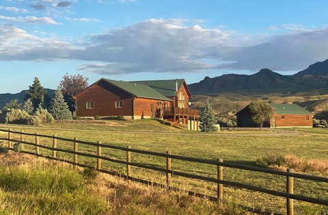 The Wapiti Bear Den is to the right of the main house in the photo. 