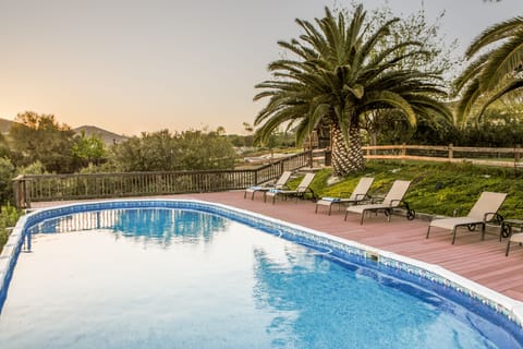 Lounge with a glass of wine as the Sun fades into stars