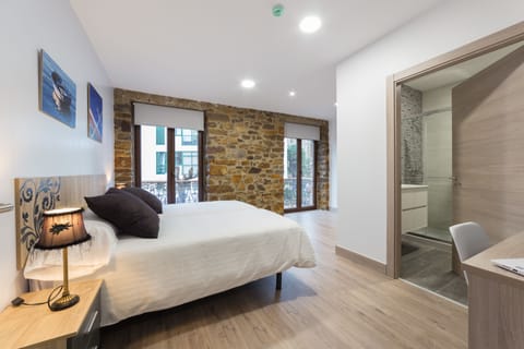 Premium bedding, memory foam beds, in-room safe, desk