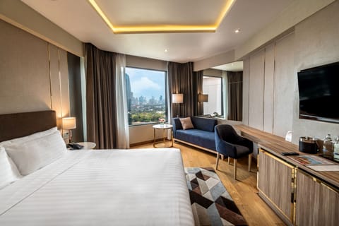 Premier King Bed | In-room safe, laptop workspace, blackout drapes, iron/ironing board