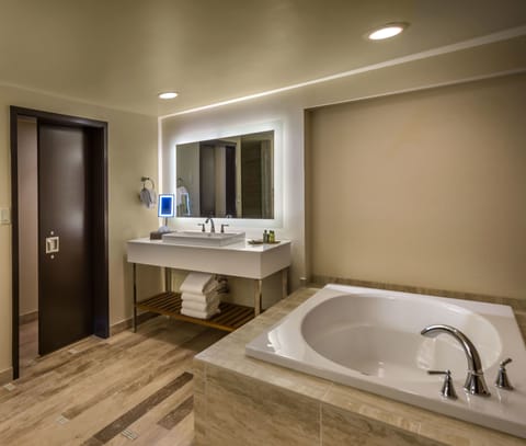 Shower, designer toiletries, hair dryer, towels