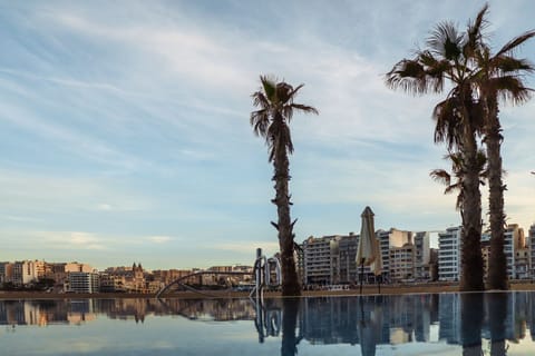 Indoor pool, outdoor pool, free cabanas, pool umbrellas