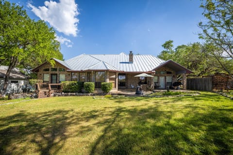 Backyard with outdoor dining and grill