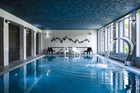 Indoor pool, seasonal outdoor pool, pool umbrellas, sun loungers