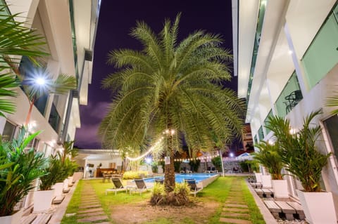Outdoor pool, open 7:00 AM to 9:00 PM, sun loungers