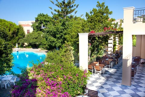 Outdoor pool, open 9 AM to 11 PM, pool umbrellas, sun loungers