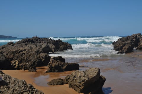 Beach nearby, white sand, 15 beach bars