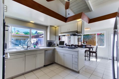 Pool View Kitchen with Sliding Door to Pool and BBQ Area