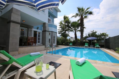 Seasonal outdoor pool, pool umbrellas, sun loungers