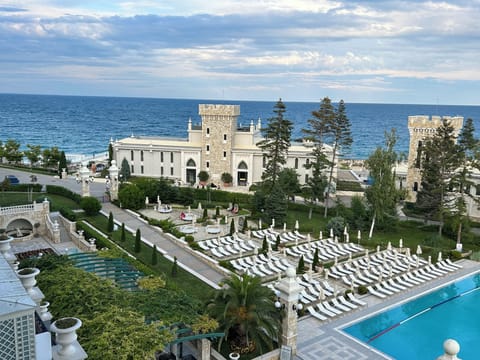 Deluxe Double Room, Sea View | Minibar, in-room safe, desk, laptop workspace