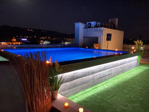 Seasonal outdoor pool, open 8:00 AM to 7:30 PM, sun loungers