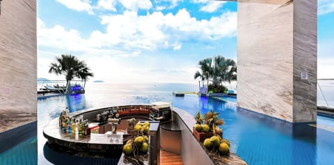Outdoor pool, open 10:00 AM to 6:00 PM, pool umbrellas, sun loungers