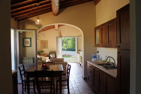 Family Apartment, 2 Bedrooms, Ground Floor (Marrone) | In-room dining