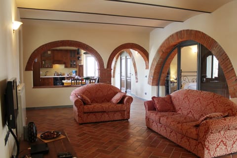 Family Apartment, 3 Bedrooms (Giallo) | Living room | 32-inch flat-screen TV with satellite channels, TV, DVD player