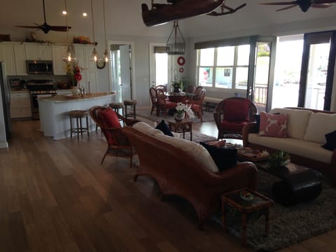 MAIN HOUSE LIVING RM.OPEN TO KITCHEN & DINING; OUTRIGGER ON CEILING;WINDOWS/VIEW