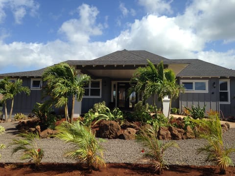 MAIN HOUSE FRONT ENTRANCE WITH LUSH LANDSCAPING; ACCESS EASY PORTE COCHERE
